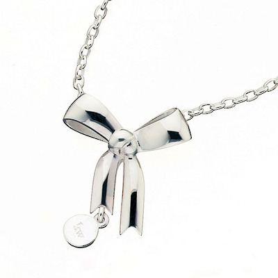 Karen Walker classic Bow Necklace in Silver.